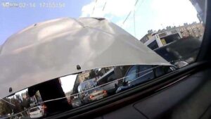 opening-bonnet-while-driving